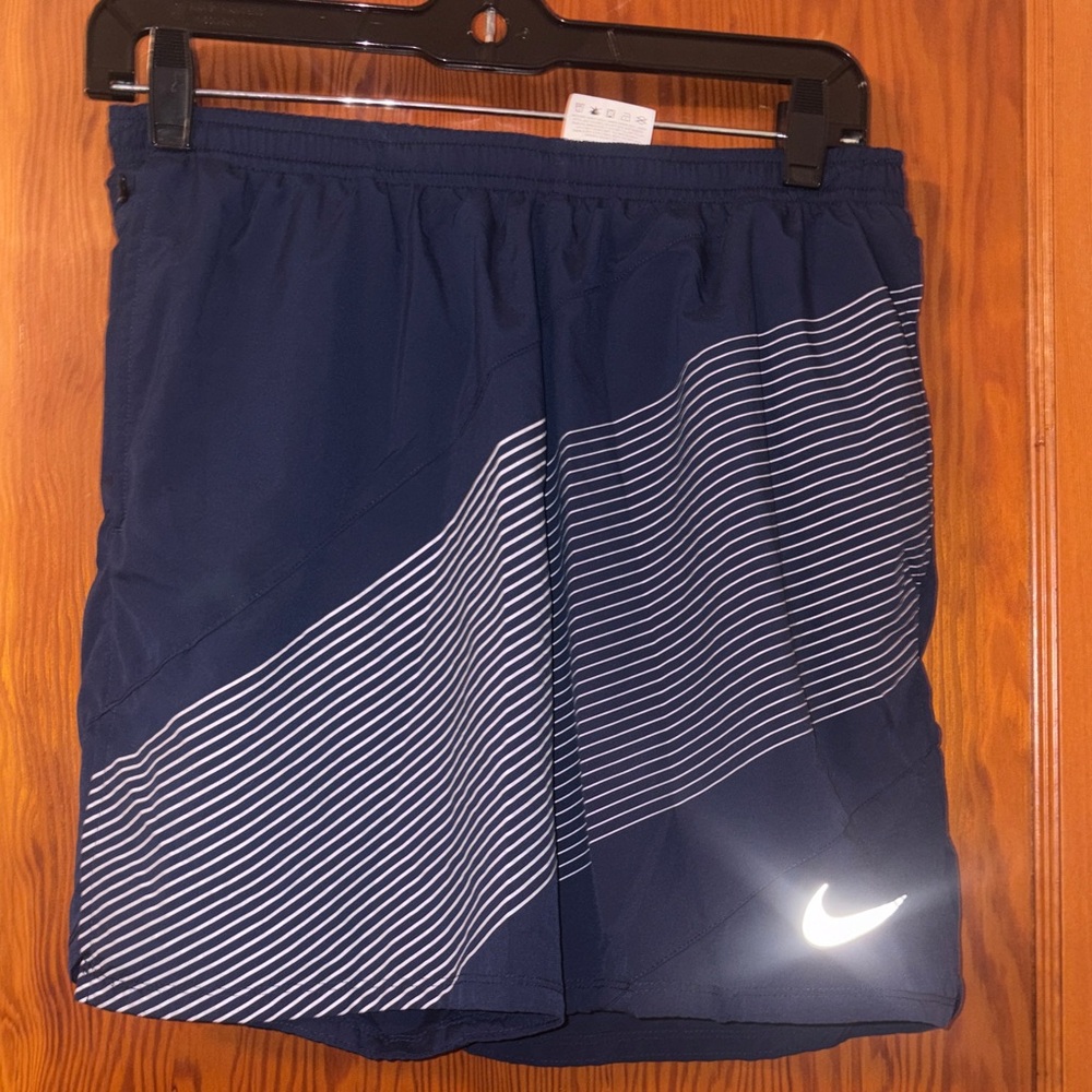 Nike Men's Dark Blue Athletic Shorts with White Stripes
